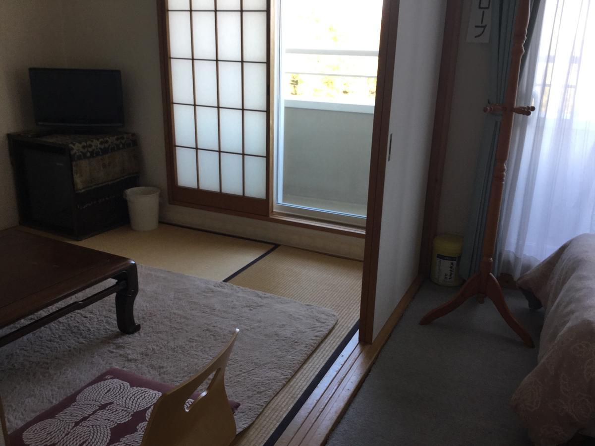 Chiisana Hotel Hanaikada Ито Экстерьер фото